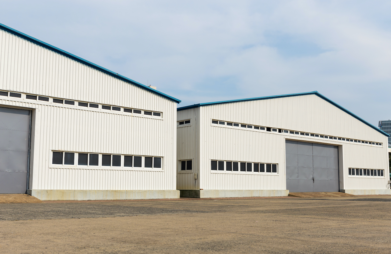 Large logistics facility with warehouse and vehicle access operations
