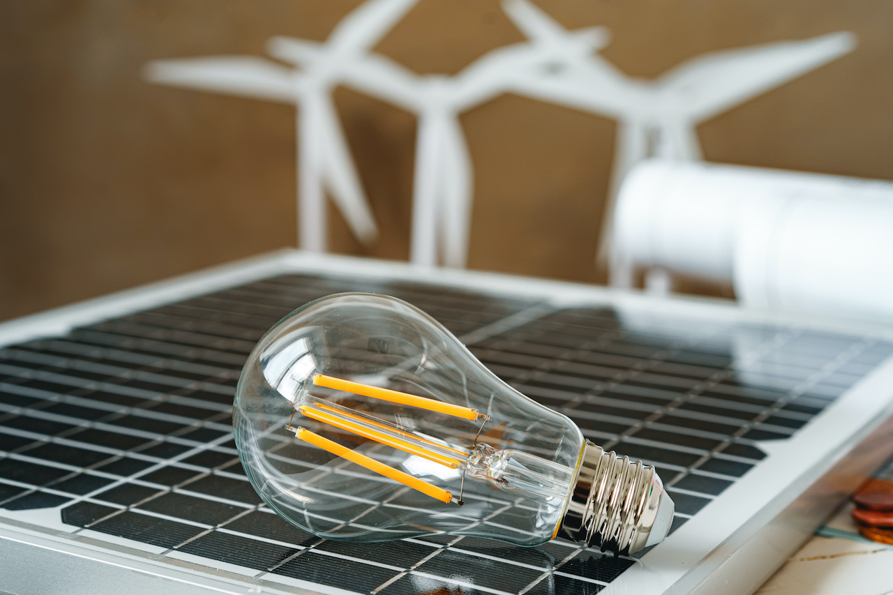 An efficient energy management system showing a light bulb and a solar panel